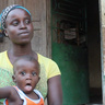 Women with two children being interviewed in Guinea-Bissau for Jacqueline Rowe's fieldwork project