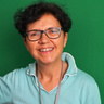 Portrait of Maria Teresa Guasti on green background