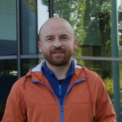 Dr Andrew Caines outside Cambridge Computer Lab