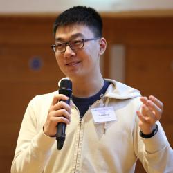 Zhilin Wang presenting in the poster slam Cambridge Language Sciences Annual Symposium 2019