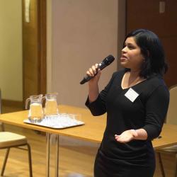 Photo of Dr Kshipra Gurunandan presenting