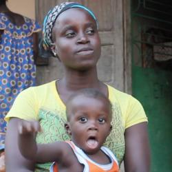 Women with two children being interviewed in Guinea-Bissau for Jacqueline Rowe's fieldwork project