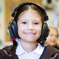 Photograph of a child in a school language lab