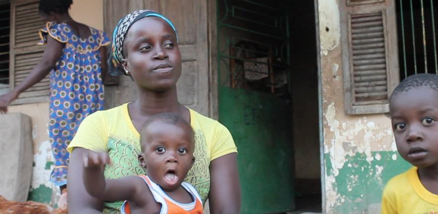 Women with two children being interviewed in Guinea-Bissau for Jacqueline Rowe's fieldwork project