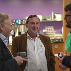 Photo of coffee break with Prof Stephen Levinson and Prof Robert Foley
