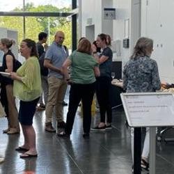 Delegates networking over lunch at the Language Sciences knowledge exchange workshop in June 2023