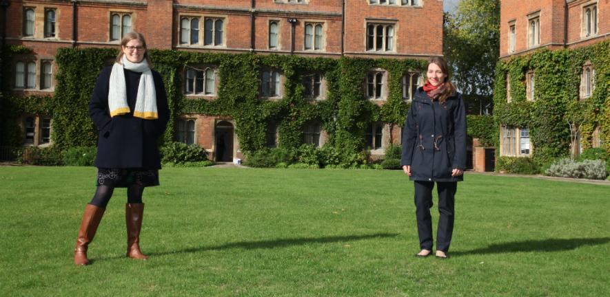 Photo of Kirsty McDougall with PhD candidate Linda Gerlach in Selwyn College gardens